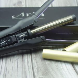 IMGP1940-e1682413701521.jpg a black and gold curling iron